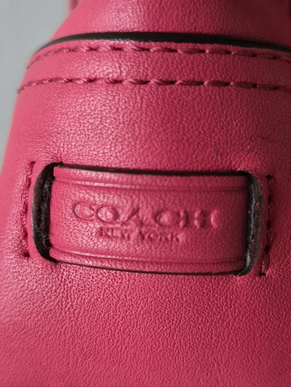 COACH Vintage Y2k Hadley Field Bag in a vibrant strawberry pink color.